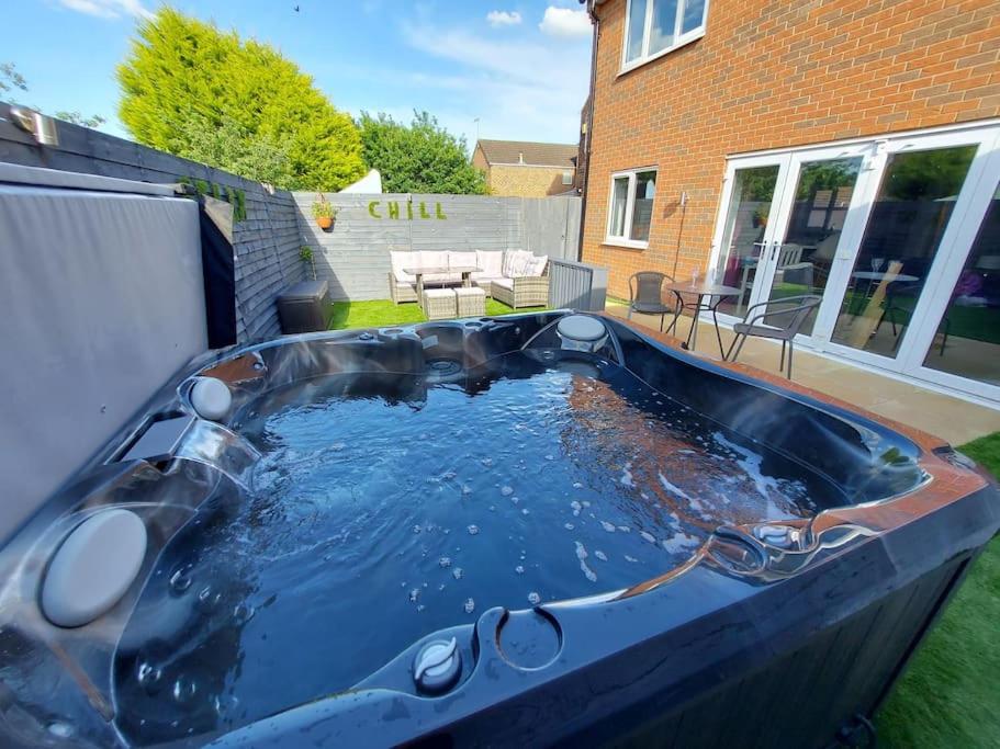 a hot tub in the backyard of a house at Hot Tub house close to Woodland and Peak District in Brimington