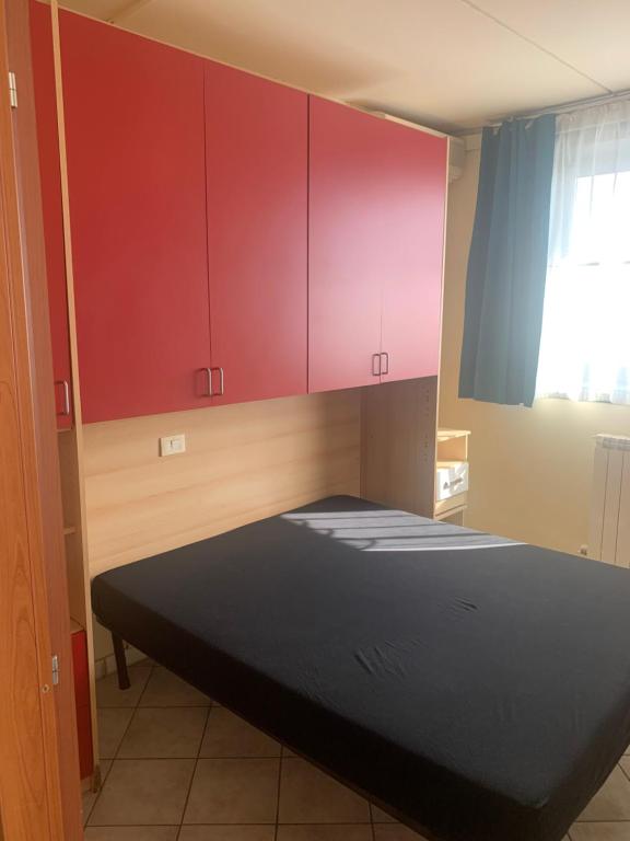 Ένα ή περισσότερα κρεβάτια σε δωμάτιο στο Residence Giulia