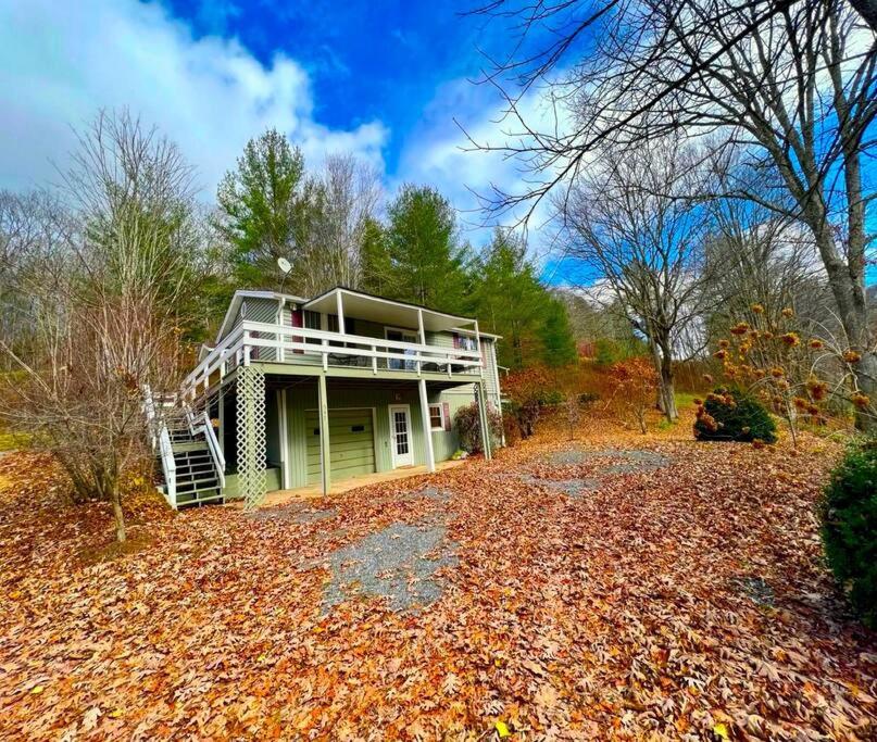 a house sitting on top of a pile of leaves at Home in Newland with River Views in Newland
