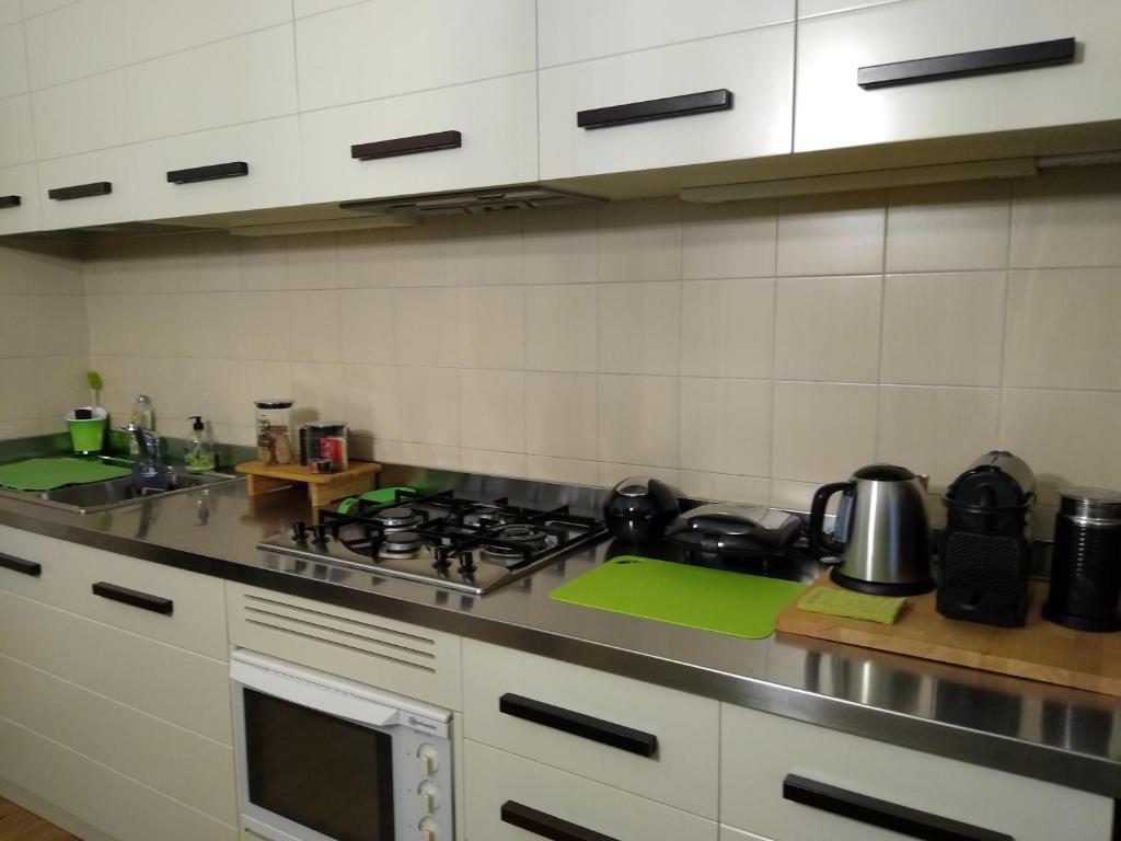Kuchyň nebo kuchyňský kout v ubytování Mi AN HOME