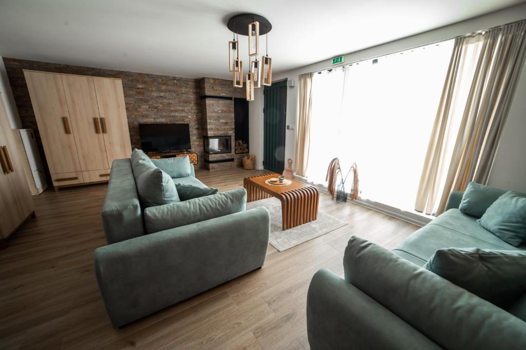 Posezení v ubytování Tarvil Apartmani - Zaovine