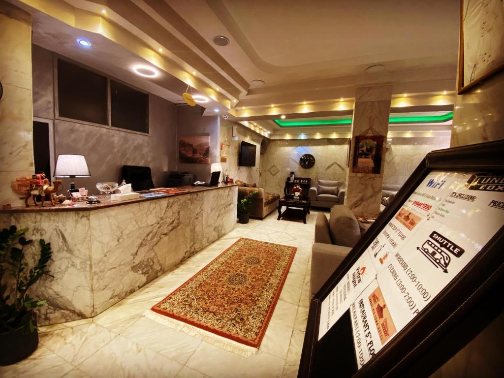 TV a/nebo společenská místnost v ubytování Anbat Midtown Hotel