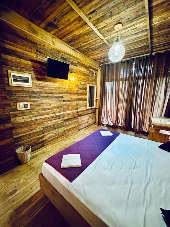 Postel nebo postele na pokoji v ubytování Winwood Ella
