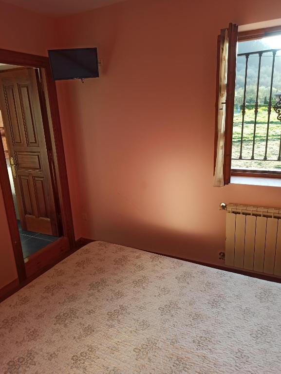 Postel nebo postele na pokoji v ubytování CASA ALDEA LOS CASTAÑOS
