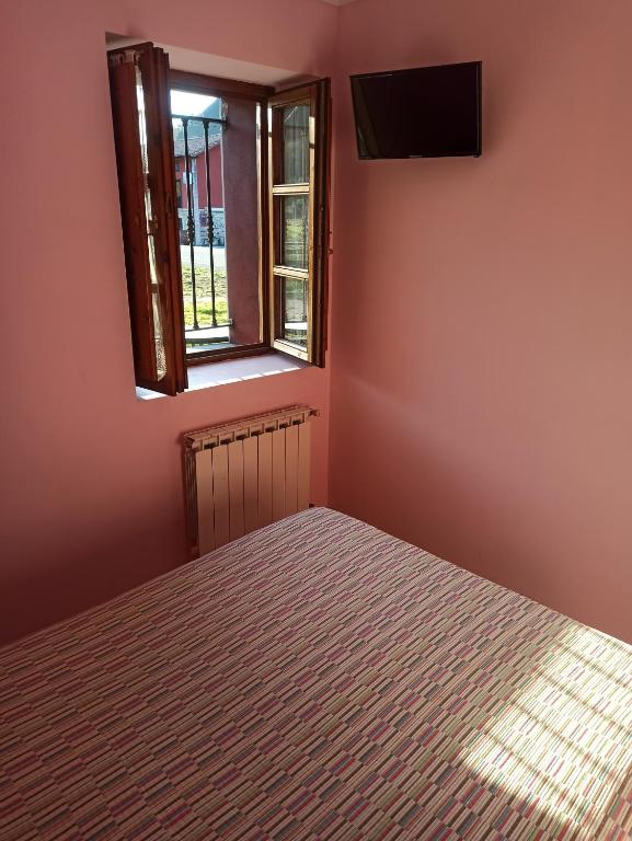 Postel nebo postele na pokoji v ubytování CASA ALDEA LOS CASTAÑOS