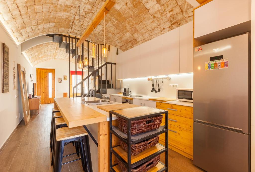 A kitchen or kitchenette at Sant Rafel House