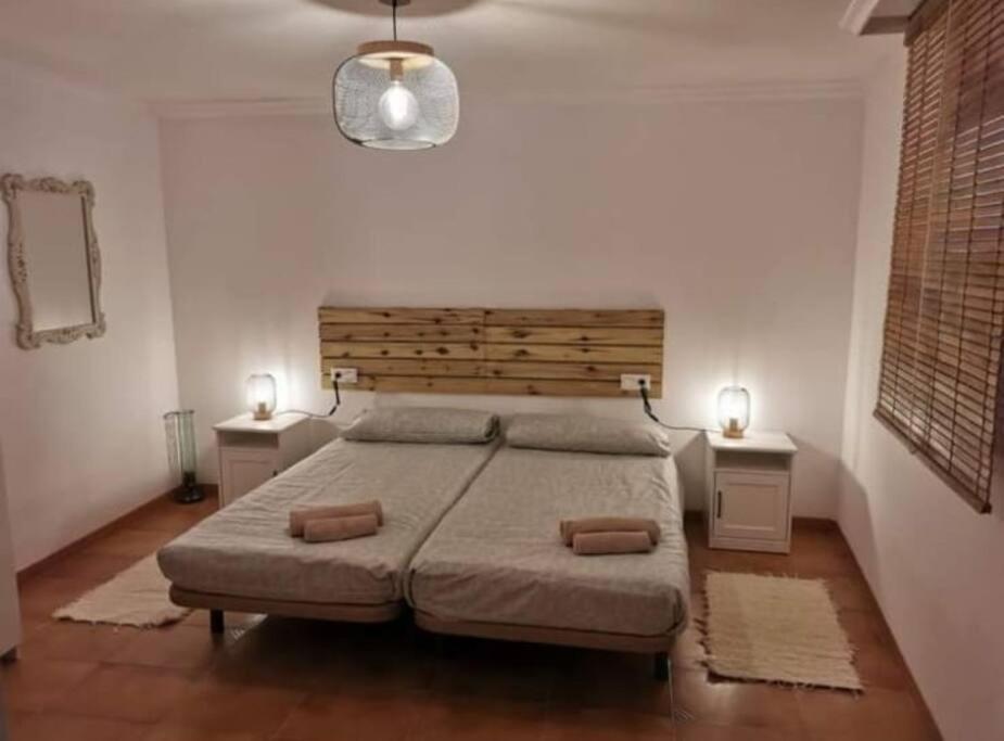 Säng eller sängar i ett rum på Samaruc
