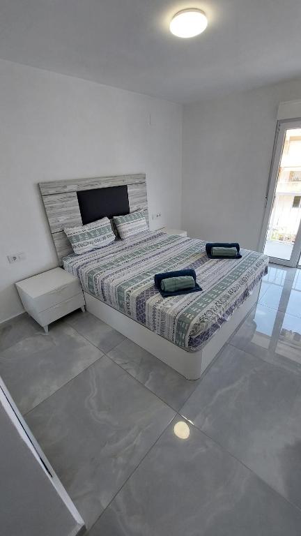 Posteľ alebo postele v izbe v ubytovaní Ibi Apartamentos la Cantera Peñíscola