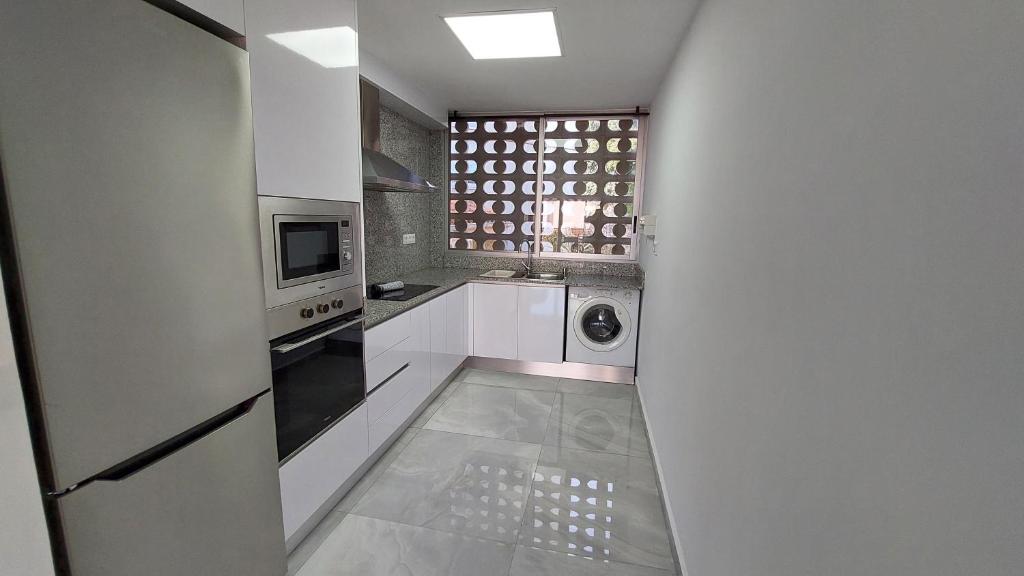 Kuchyňa alebo kuchynka v ubytovaní Ibi Apartamentos la Cantera Peñíscola