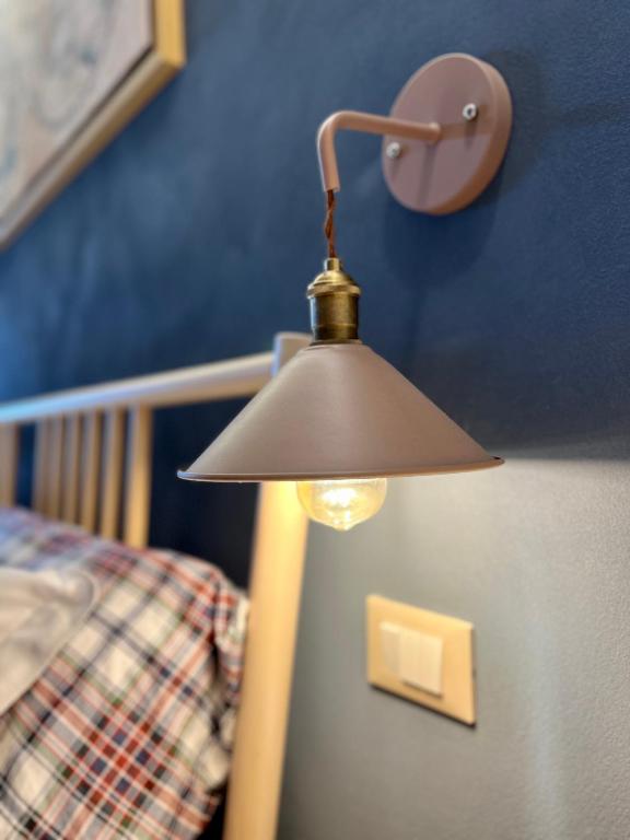 Postel nebo postele na pokoji v ubytování Peperosa in collina B&B