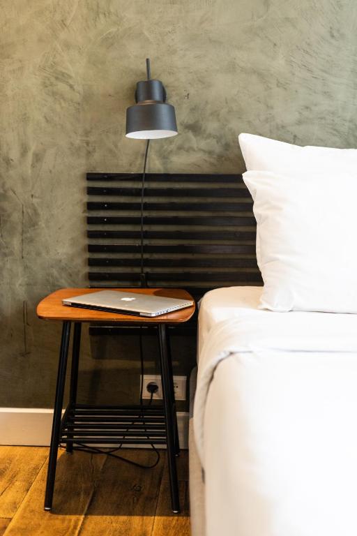 Postel nebo postele na pokoji v ubytování Weber Hotel 397