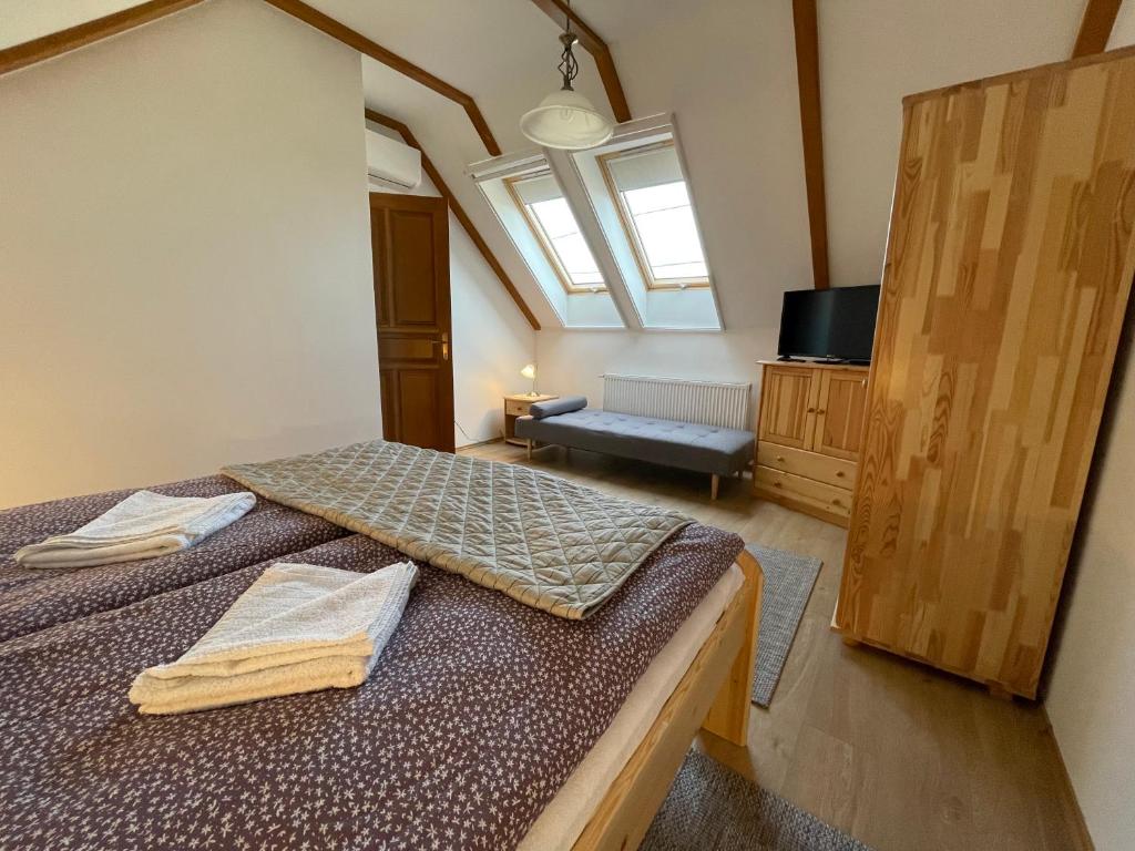 Letto o letti in una camera di Kis-Duna Vendégház