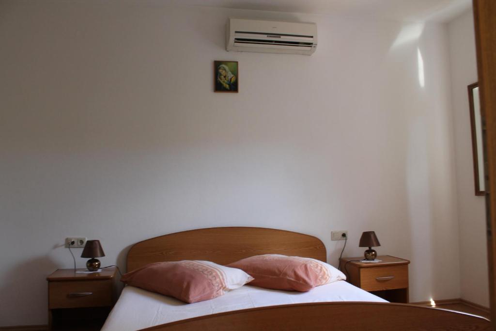 Posteľ alebo postele v izbe v ubytovaní Blanka Apartment