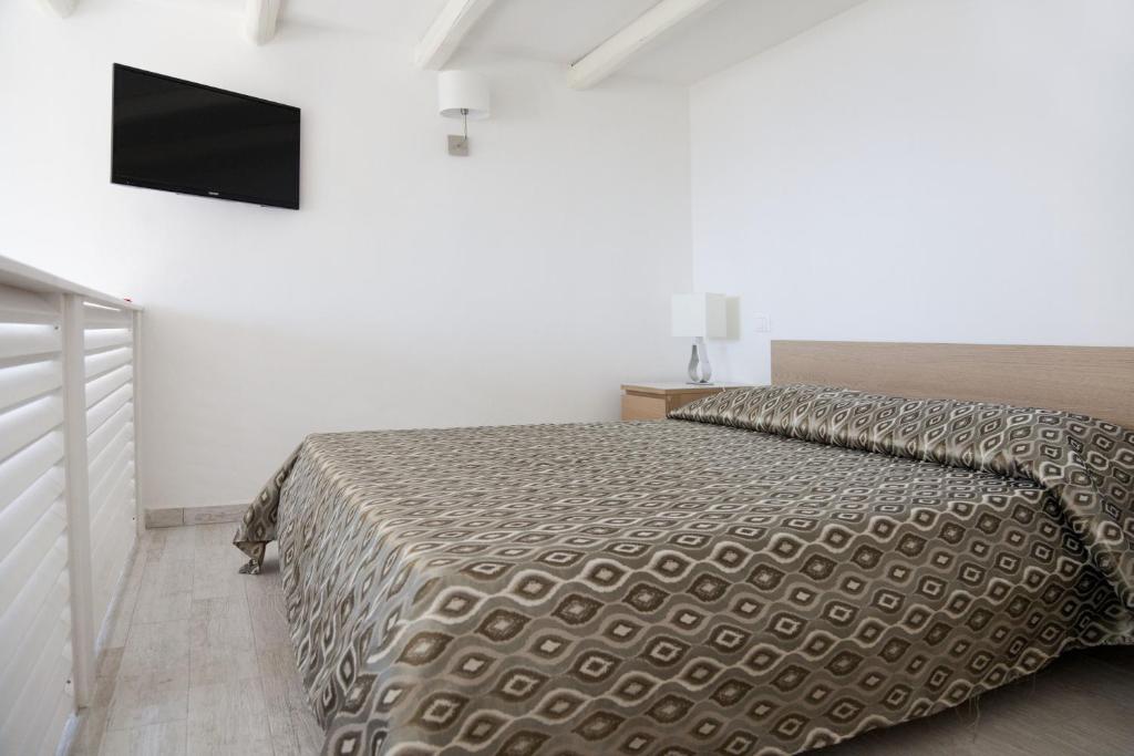 Cama o camas de una habitación en B&B La Palma