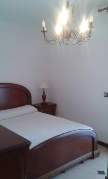 A bed or beds in a room at Casa Lorena