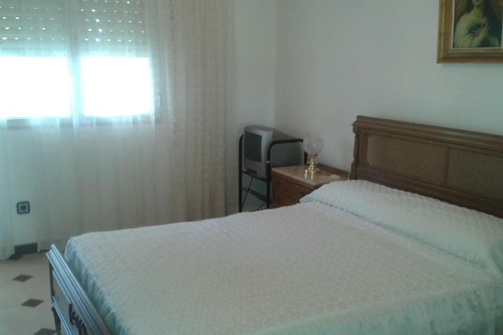 A bed or beds in a room at Casa Lorena