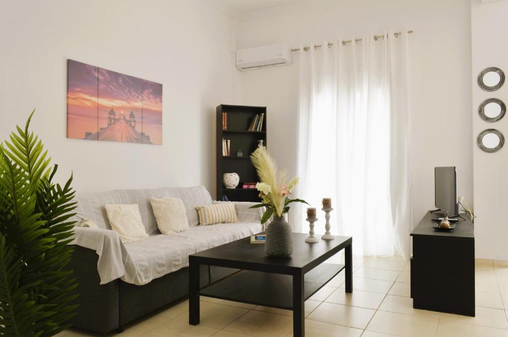 Гостиная зона в Pasiphae Heraklion Apartment