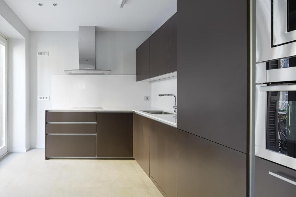 Kuchyň nebo kuchyňský kout v ubytování Easo Suite 7 by FeelFree Rentals