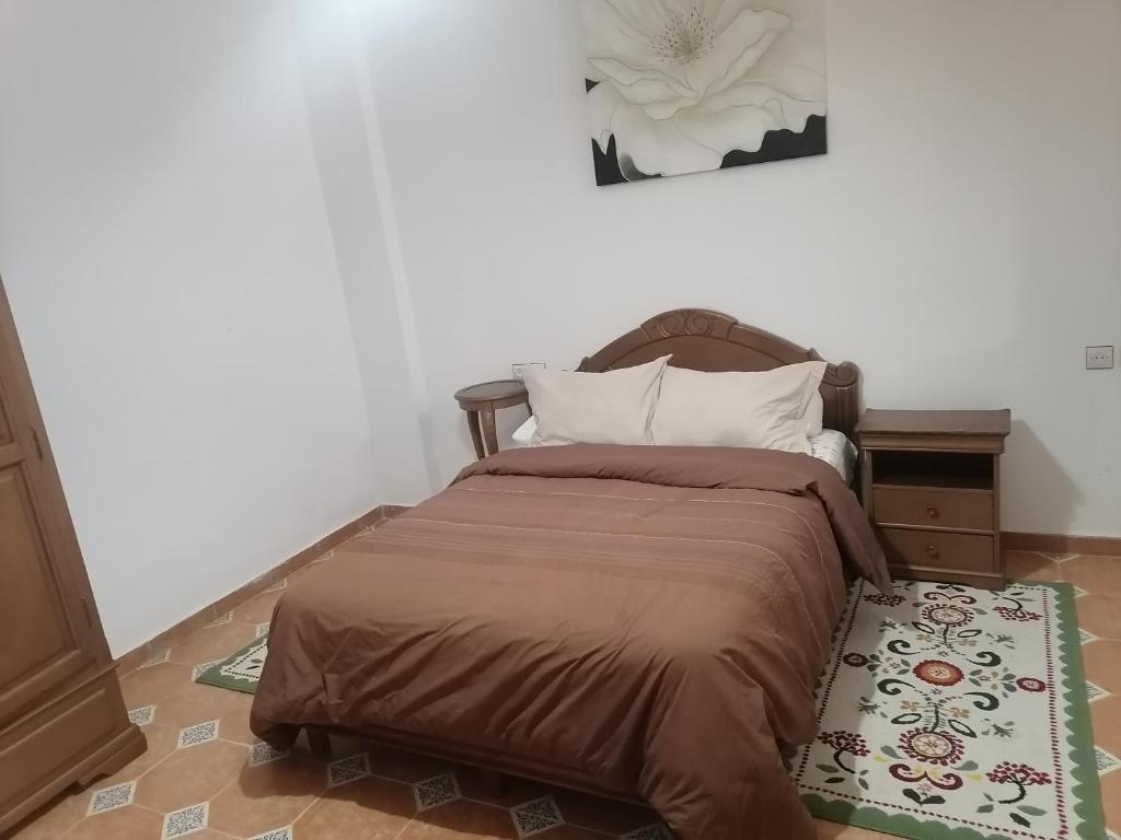 Postel nebo postele na pokoji v ubytování studio apartment
