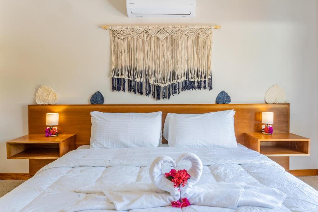 Postel nebo postele na pokoji v ubytování Residencias Samara