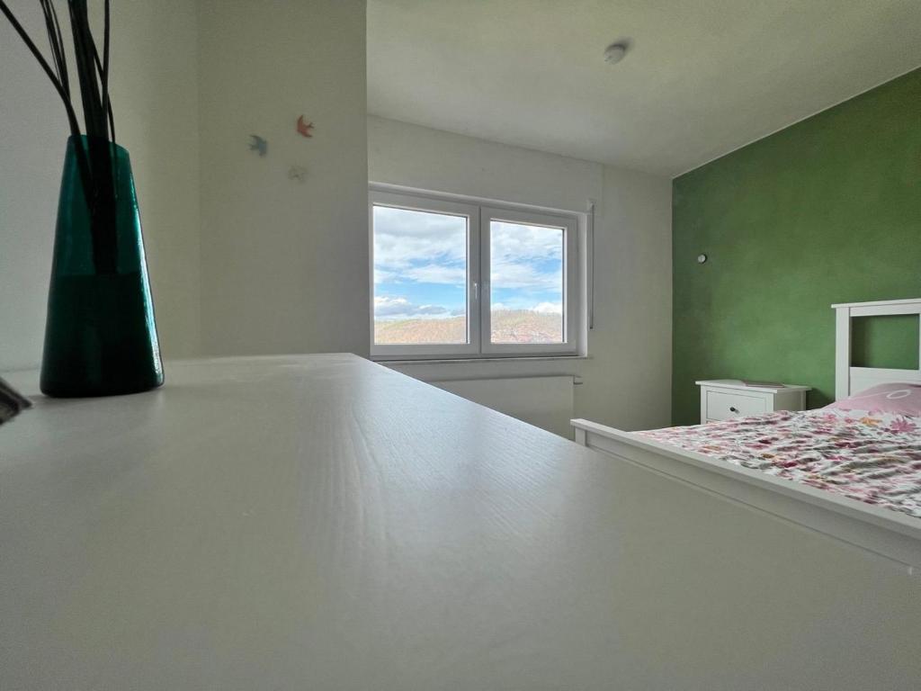 Postel nebo postele na pokoji v ubytování Ferienhaus EifelOne