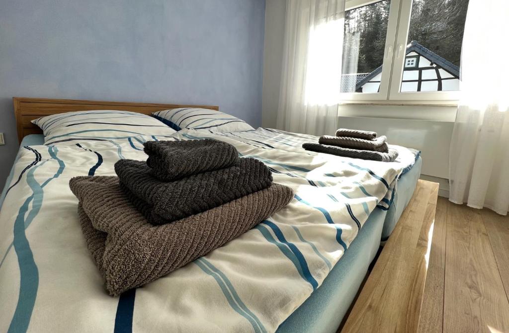 Postel nebo postele na pokoji v ubytování Ferienhaus EifelOne