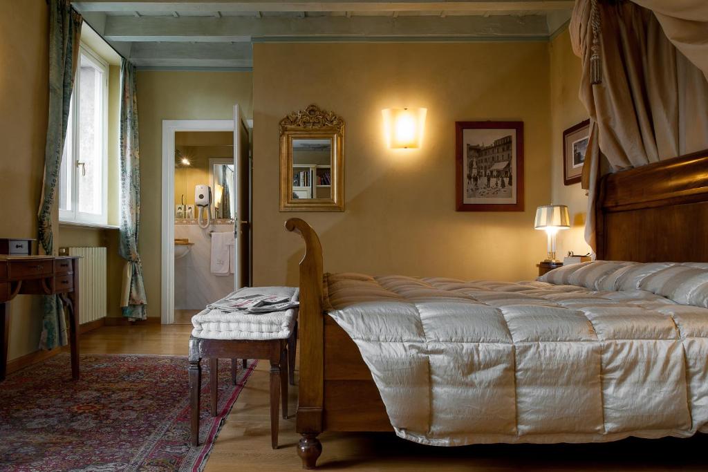 Postel nebo postele na pokoji v ubytování Domus Nova Palace - Italian Homing