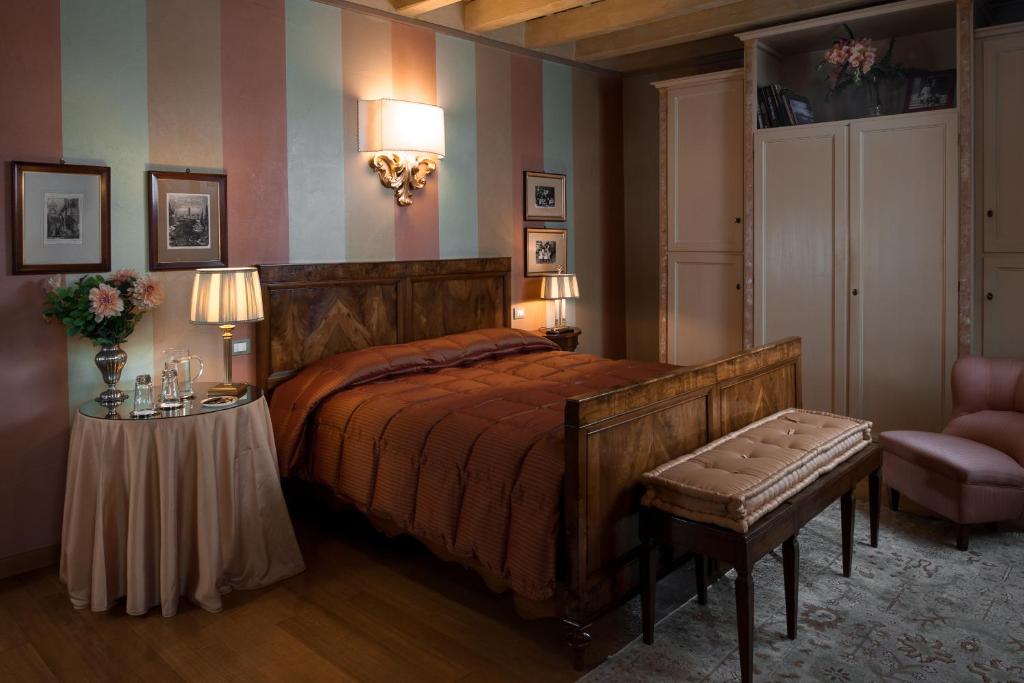 Postel nebo postele na pokoji v ubytování Domus Nova Palace - Italian Homing