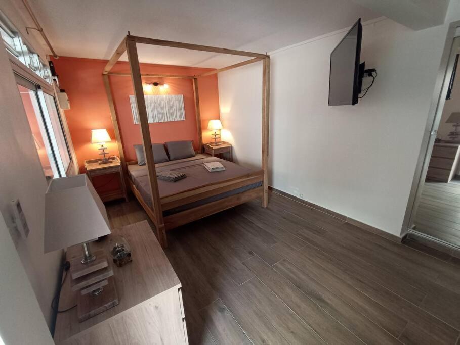 Postel nebo postele na pokoji v ubytování Joli studio le Caribbean Tropical