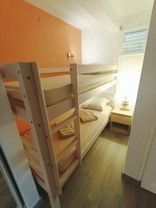 Postel nebo postele na pokoji v ubytování Joli studio le Caribbean Tropical