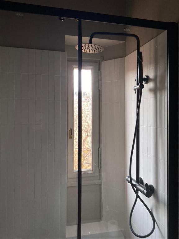 A bathroom at Bilocale di Design con Vista in Crocetta Quadronno