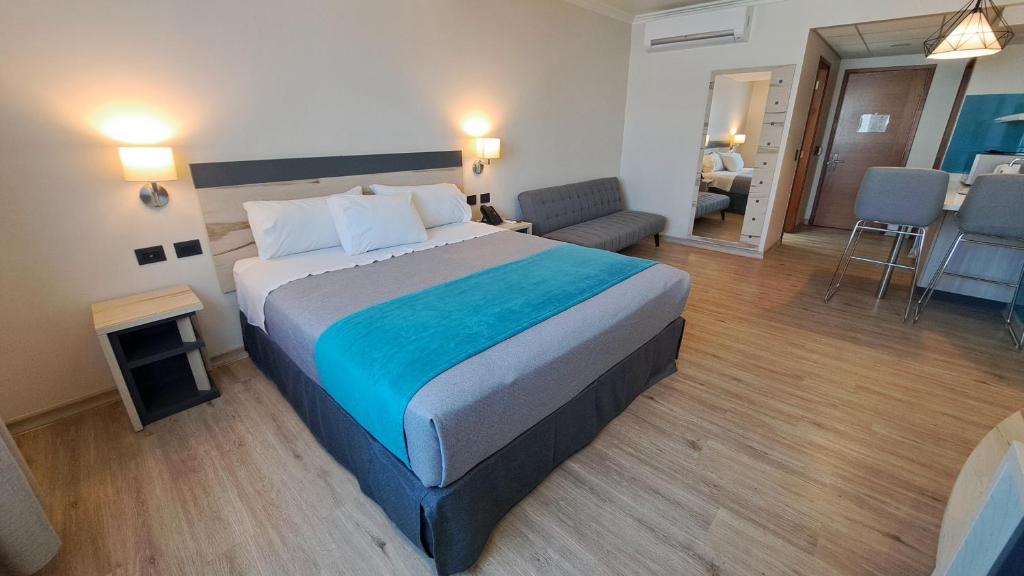 Una cama o camas en una habitación de Hotel Diego de Almagro Temuco Express