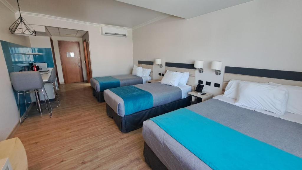 Una cama o camas en una habitación de Hotel Diego de Almagro Temuco Express