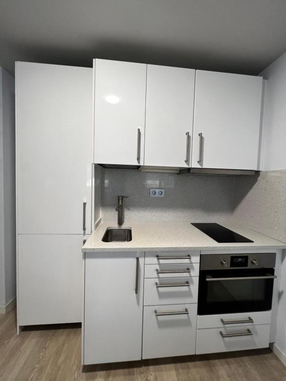 Kuchyňa alebo kuchynka v ubytovaní Studio CP Poblenou