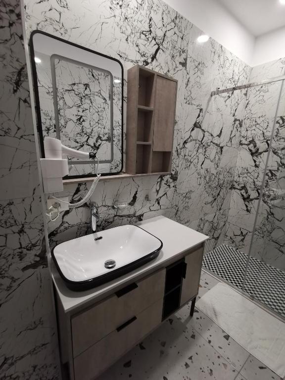 Koupelna v ubytování Te Aldo Hotel