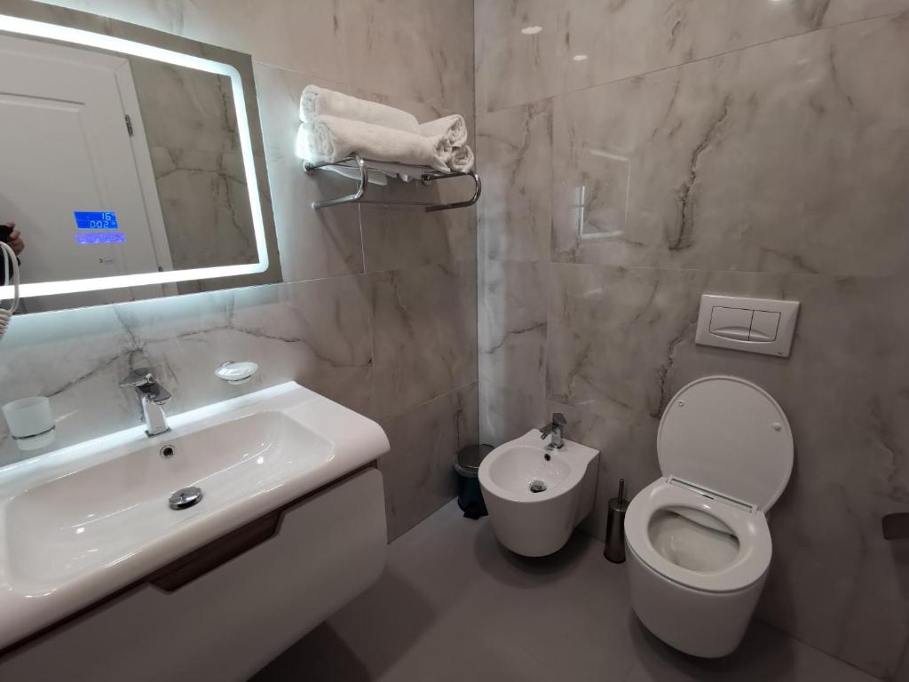 Koupelna v ubytování Te Aldo Hotel