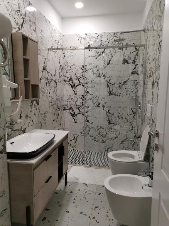 Koupelna v ubytování Te Aldo Hotel