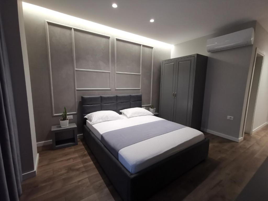 Postel nebo postele na pokoji v ubytování Te Aldo Hotel