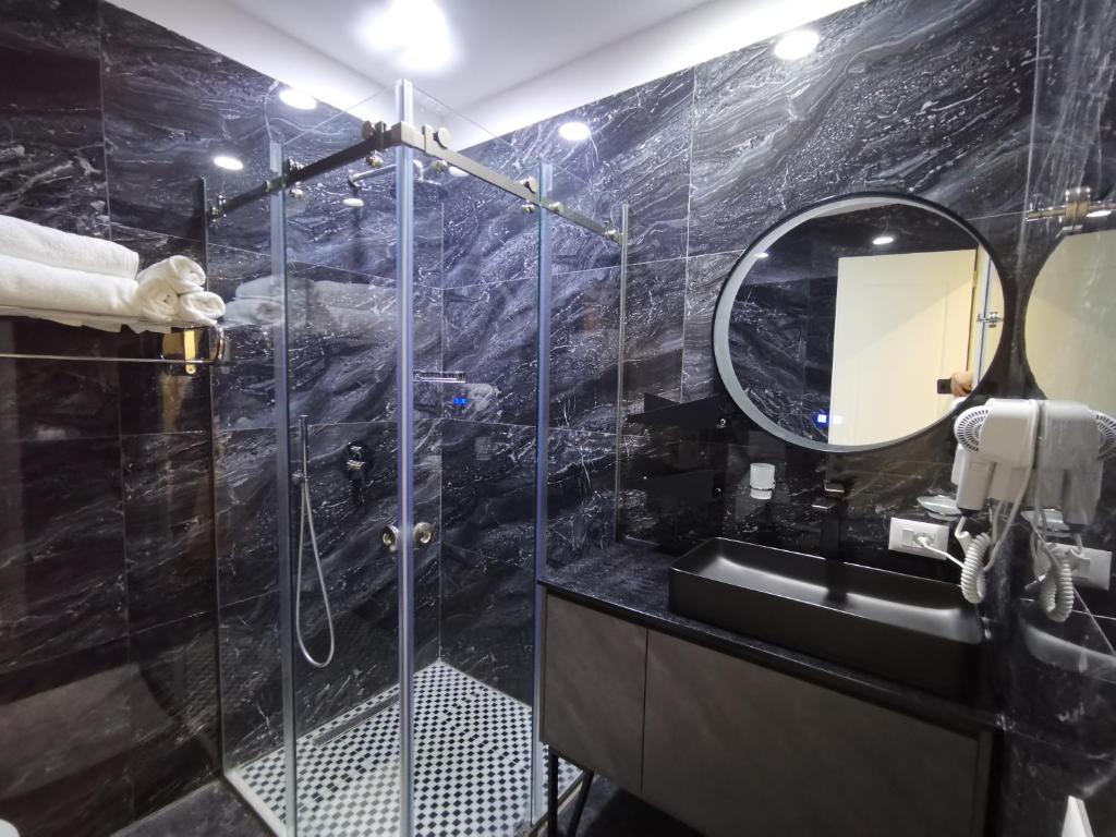 Koupelna v ubytování Te Aldo Hotel