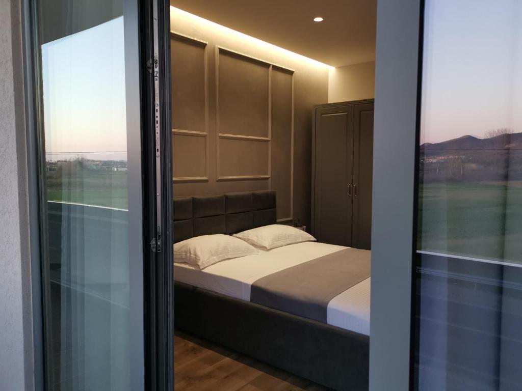 Postel nebo postele na pokoji v ubytování Te Aldo Hotel