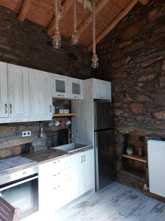 A kitchen or kitchenette at by karakas Γαστρί