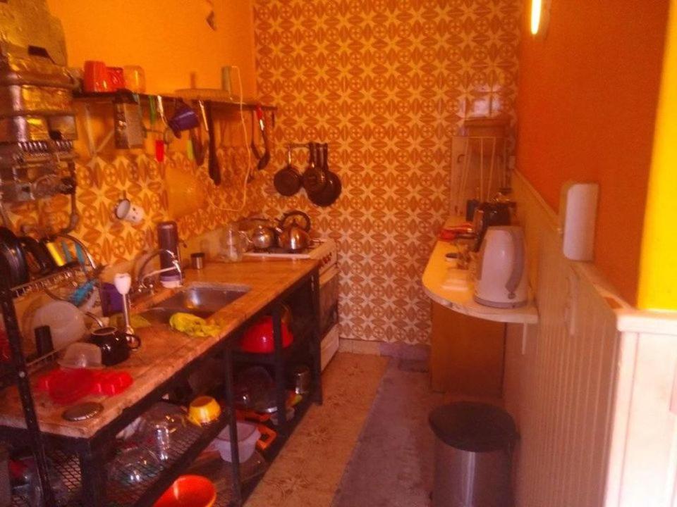 a small kitchen with a sink and a counter at Casa Paraiso in Presidente Roque Sáenz Peña