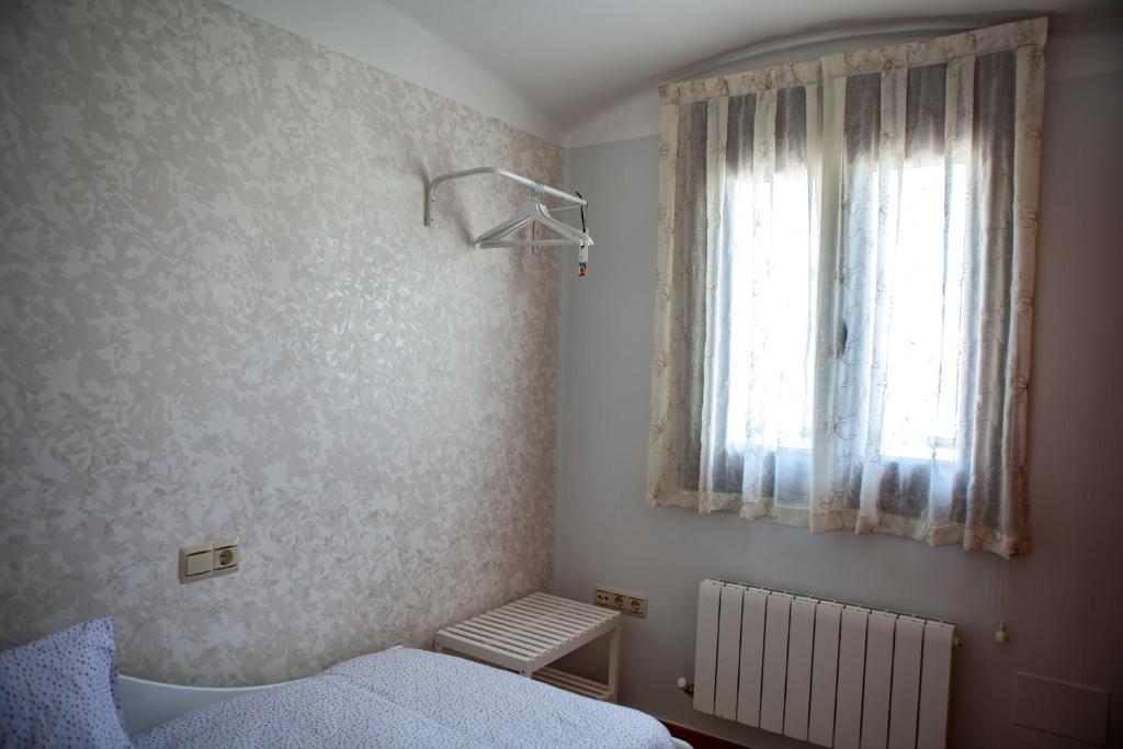 Postel nebo postele na pokoji v ubytování Mi Casita Olmedo