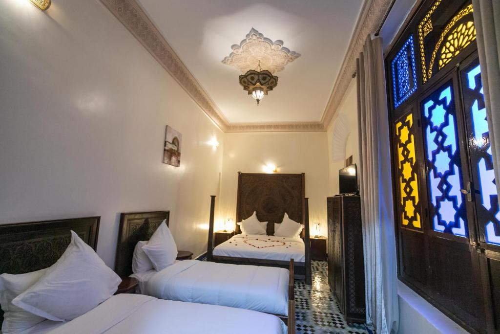 Cama o camas de una habitación en Riad Anis Fes