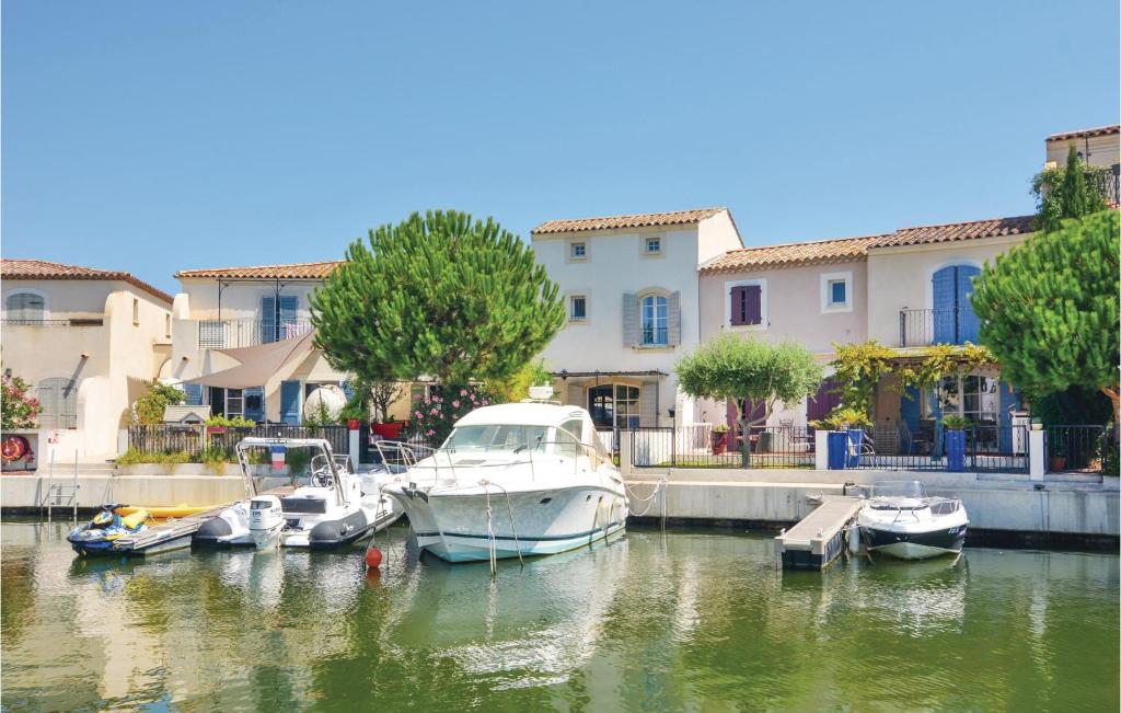 a group of boats are docked in a marina at Nice Home In Aigues-mortes With Kitchen in Aigues-Mortes