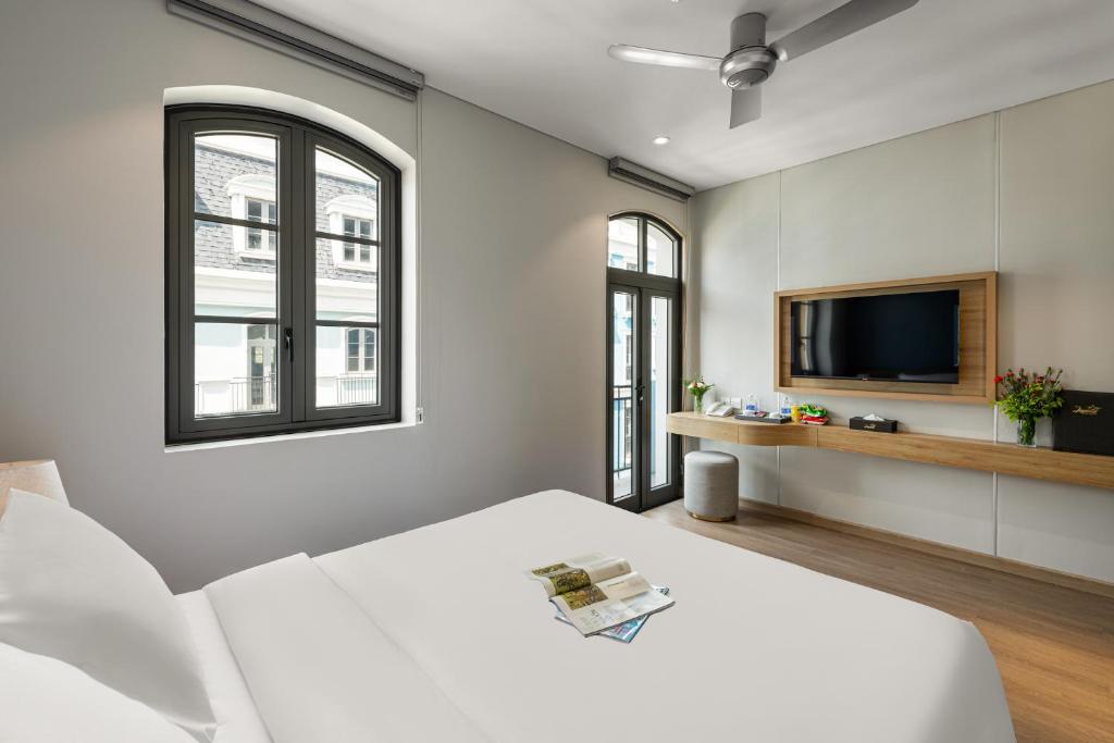 TV a/nebo společenská místnost v ubytování Laputa Hotel Phu Quoc