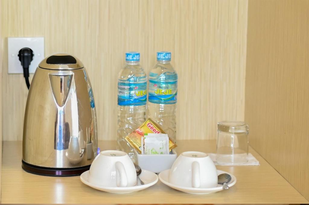 Příslušenství pro přípravu čaje a kávy v ubytování KAWANA HOTEL