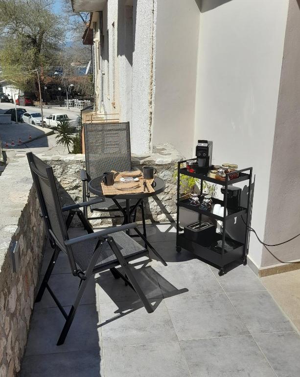 A patio or other outdoor area at Vrachos Suites