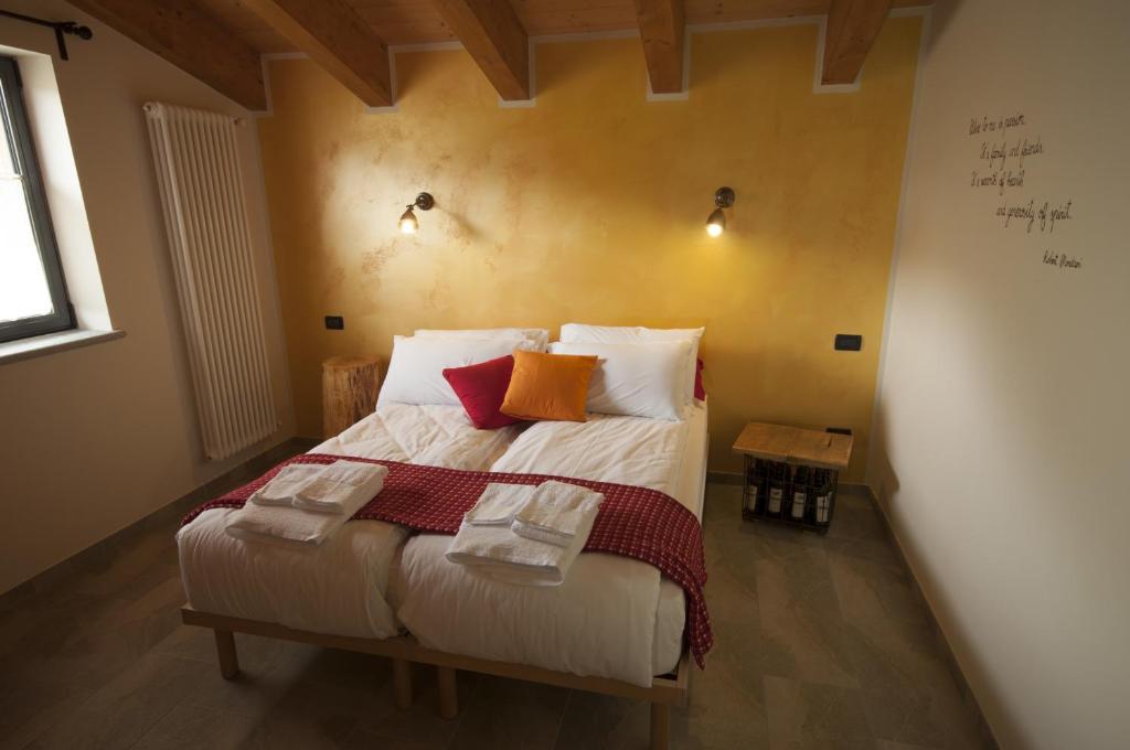 Postel nebo postele na pokoji v ubytování Maison d'hôtes Victoret