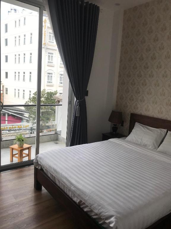 Giường trong phòng chung tại Mỹ Lan hotel